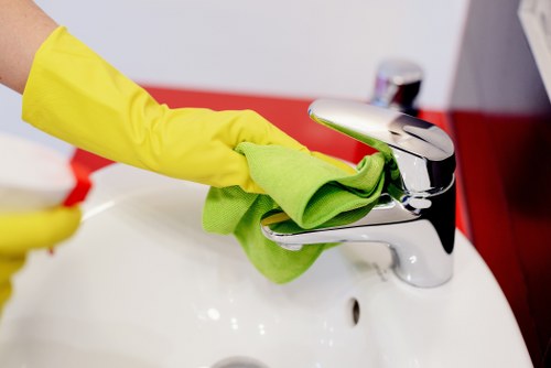 A professional cleaner providing regular home cleaning in an E3 property