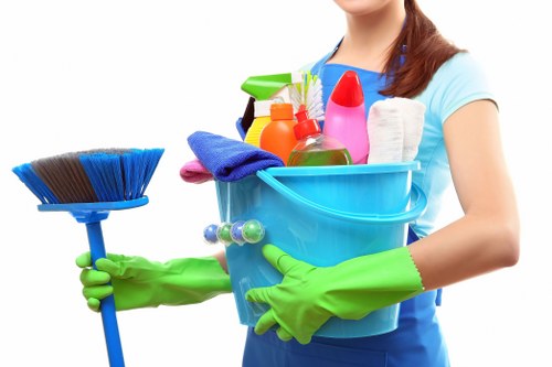 Local office cleaning team working in an E3 commercial building
