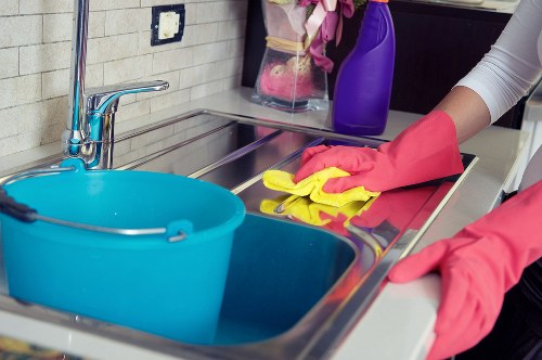 Routine kitchen and bathroom cleaning for a flat in E3